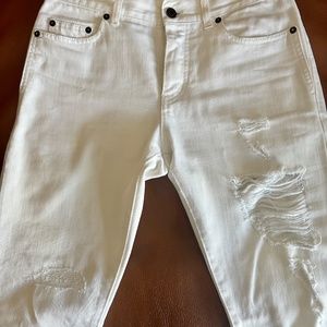 YSL distressed white slim denim
